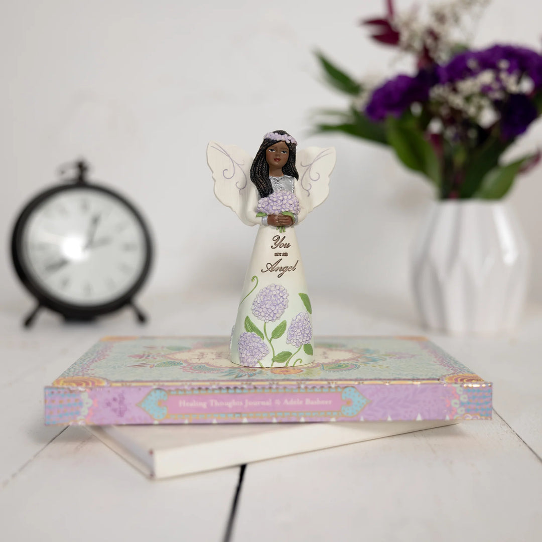 You're an Angel Angelic Figurine with Hydrangea by Pavilion Gifts (Ebony Elements Collection, Lifestyle View)